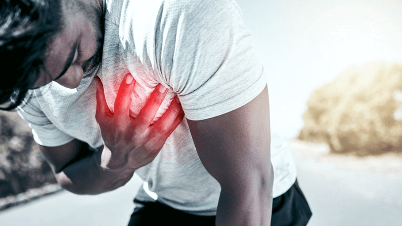 Man, fitness and heart pain with red glow for cardiac arrest, arrhythmia or accident during outdoor exercise.